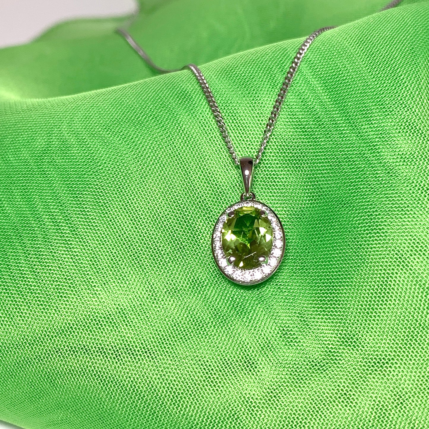 Oval peridot and cubic zirconia necklace