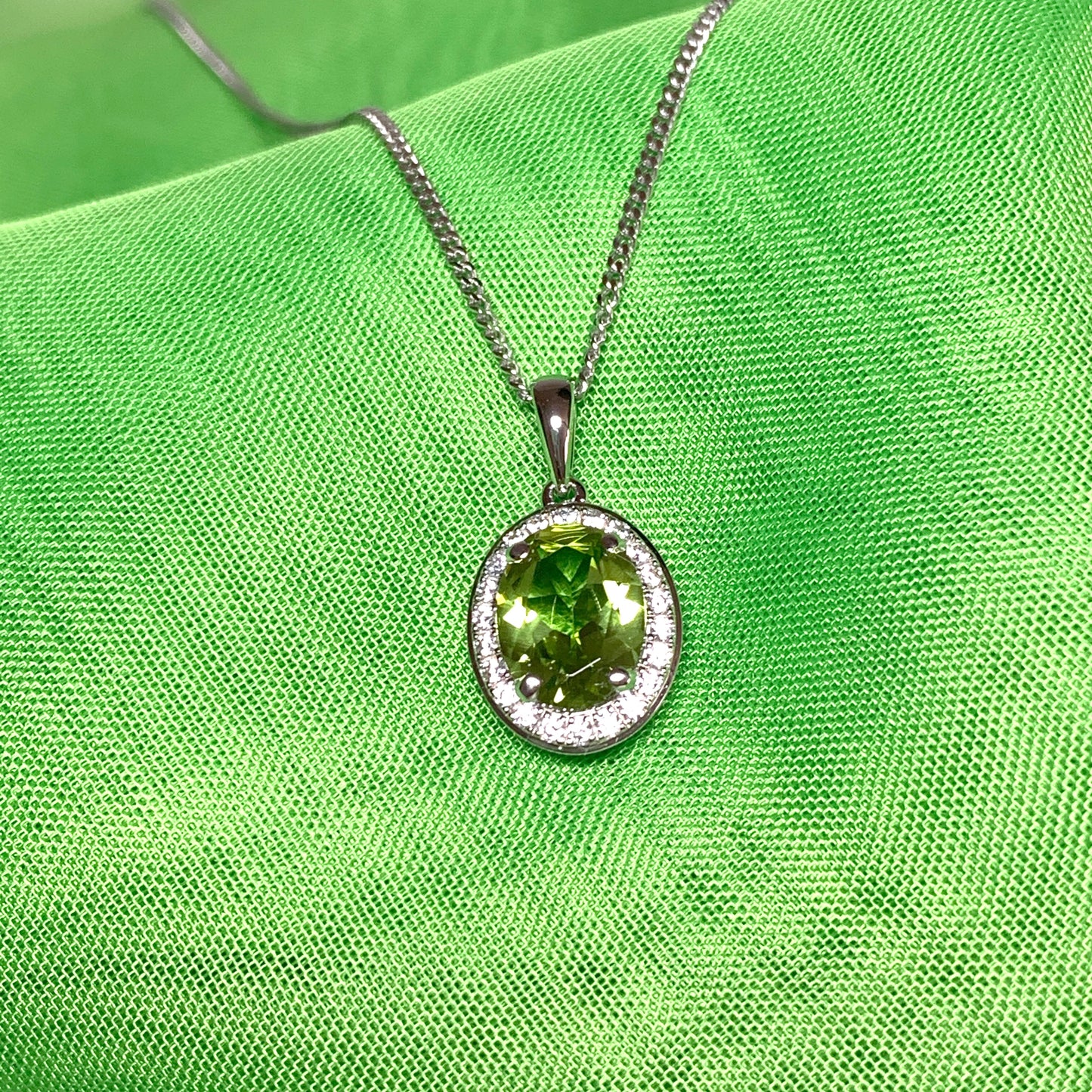 Oval peridot and cubic zirconia necklace