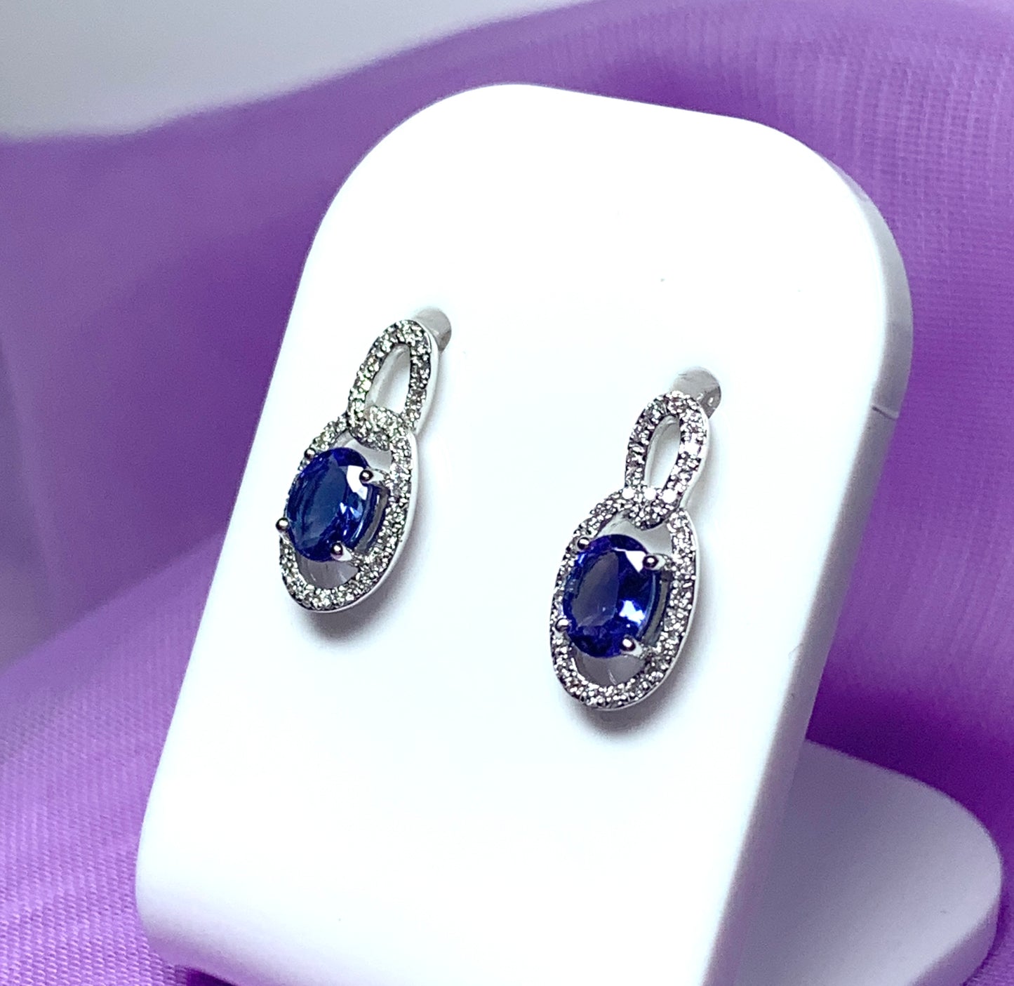 Oval cluster tanzanite and diamond earrings