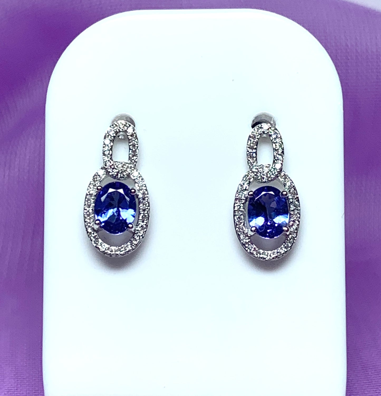 Oval cluster tanzanite and diamond earrings