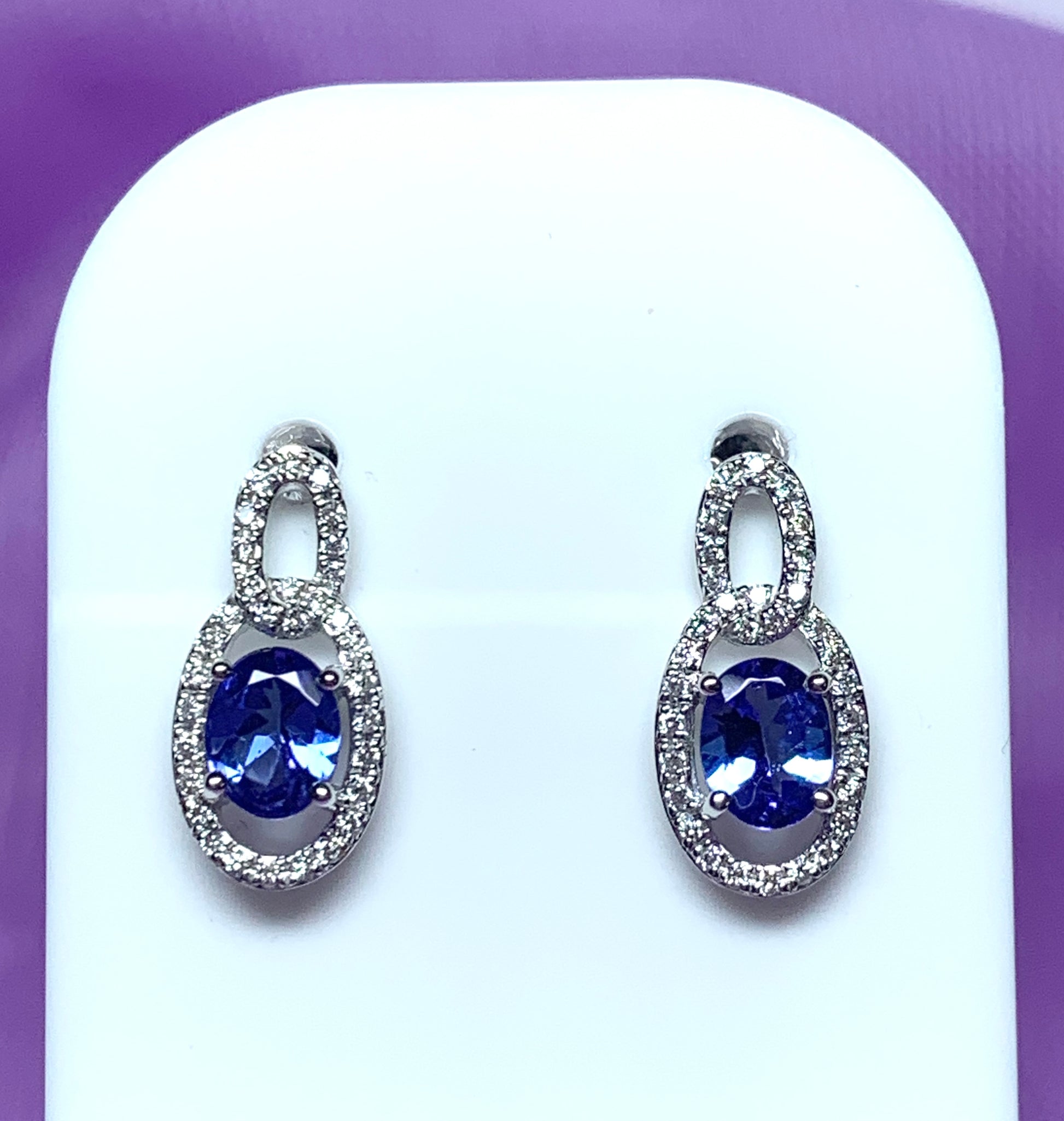 Oval cluster tanzanite and diamond earrings