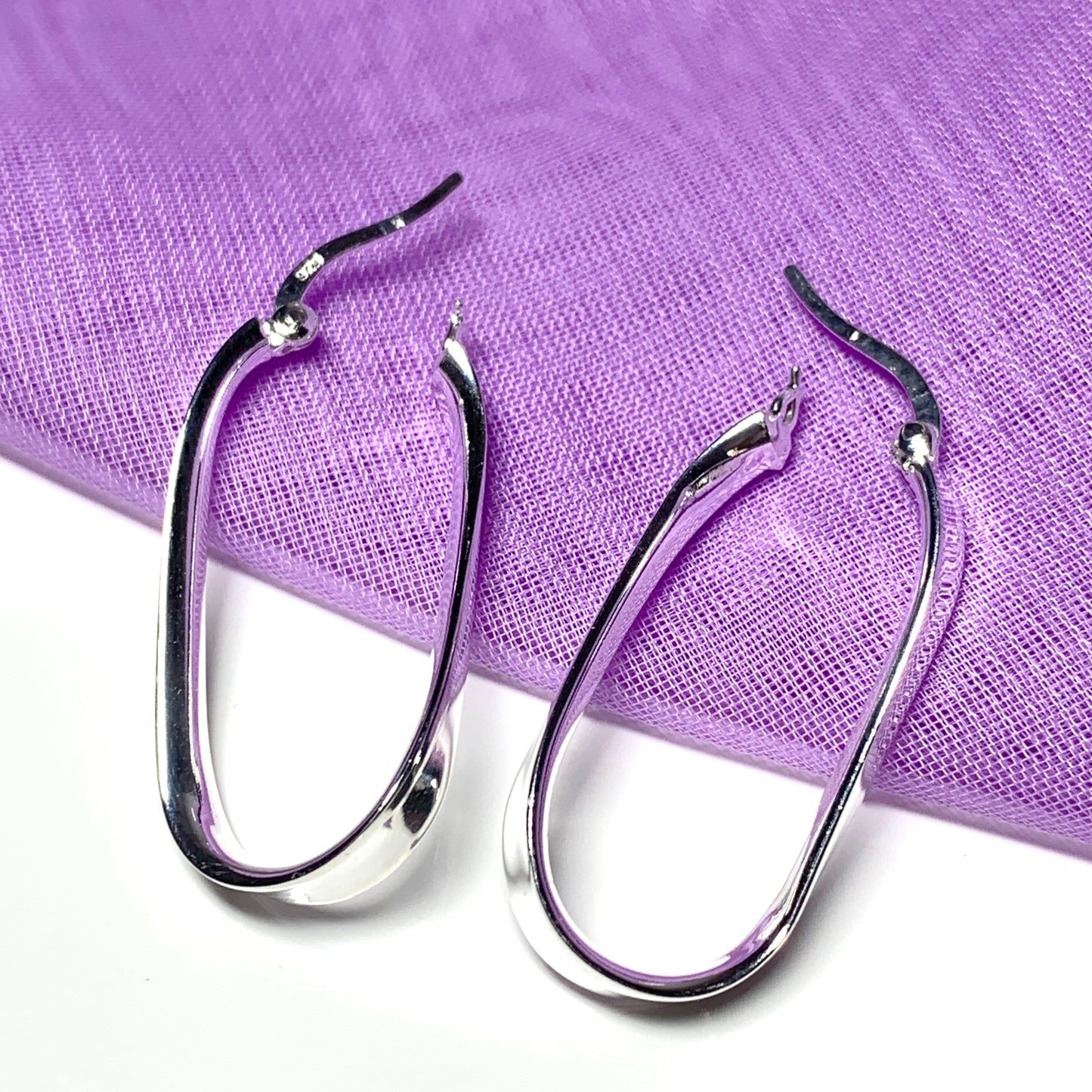 Oval twisted plain hoop earrings sterling silver