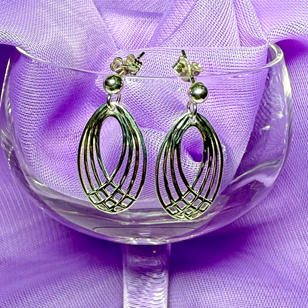 Oval shaped open drop earrings sterling silver