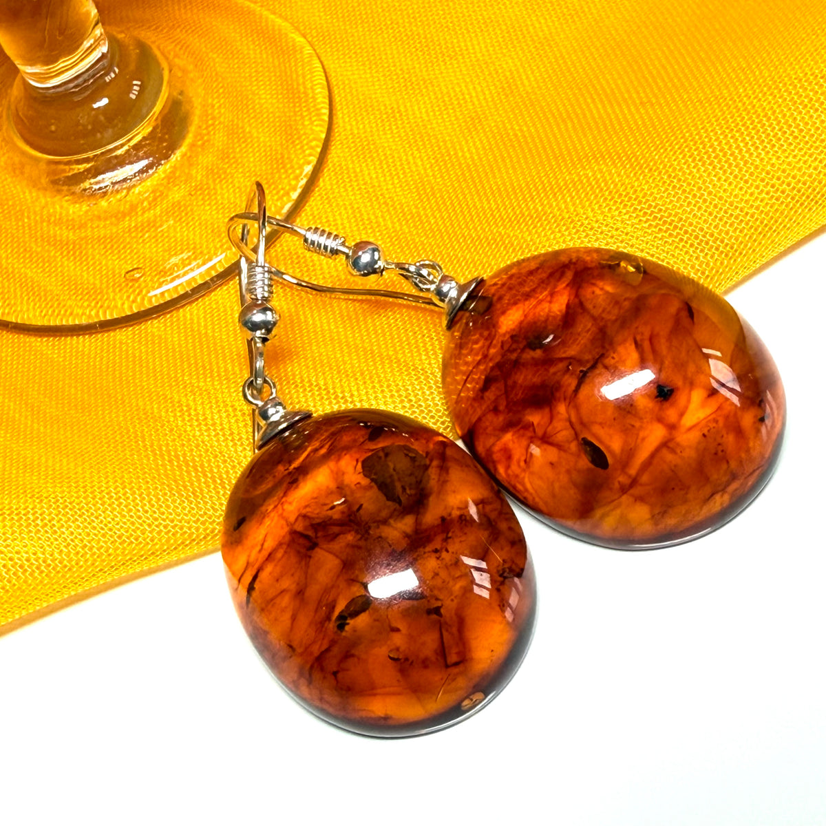 Pair of real amber drop earrings oval shaped sterling silver hooks