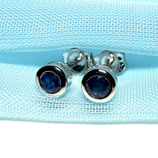 Pair of real blue sapphire earrings round white gold stud smooth rubbed over setting