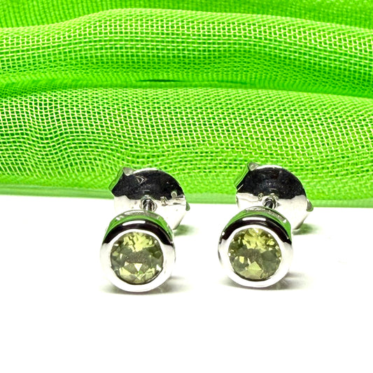 Pair of real green peridot earrings round white gold stud smooth rubbed over setting