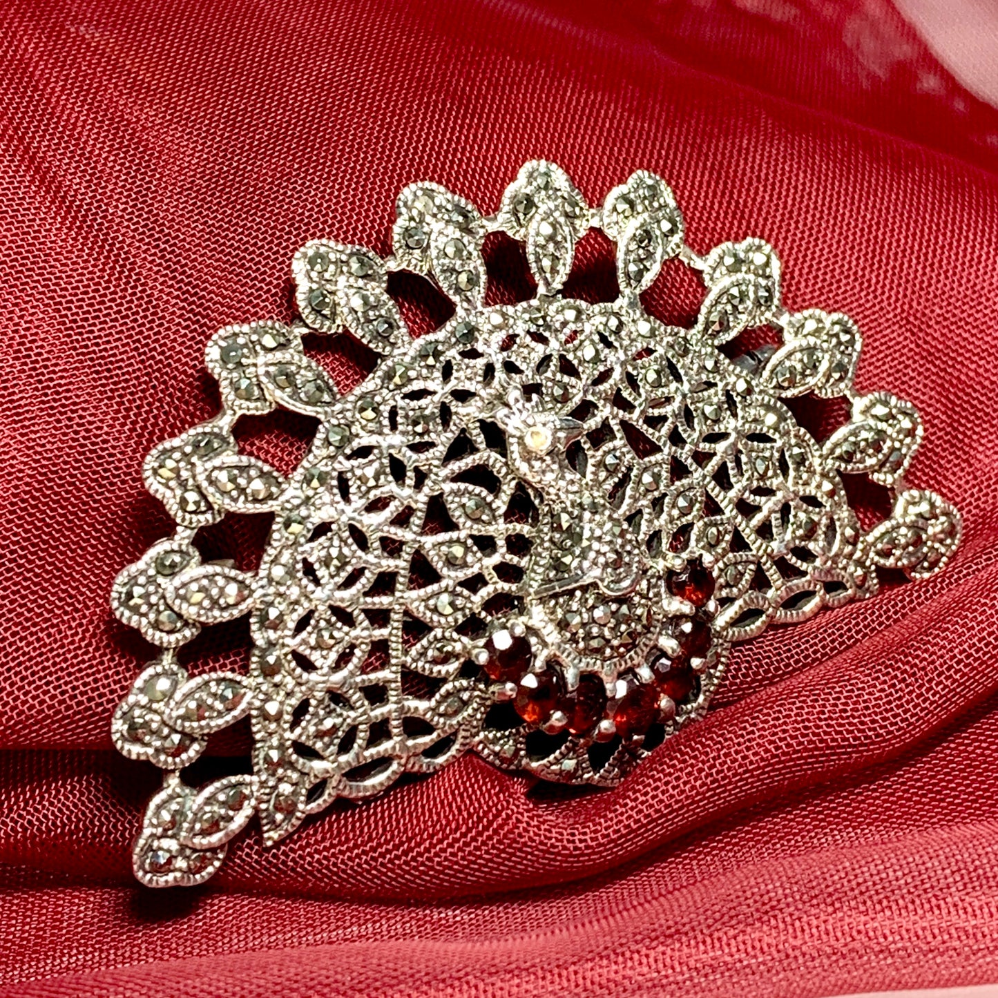 Large peacock brooch fanning it’s wings open sterling silver