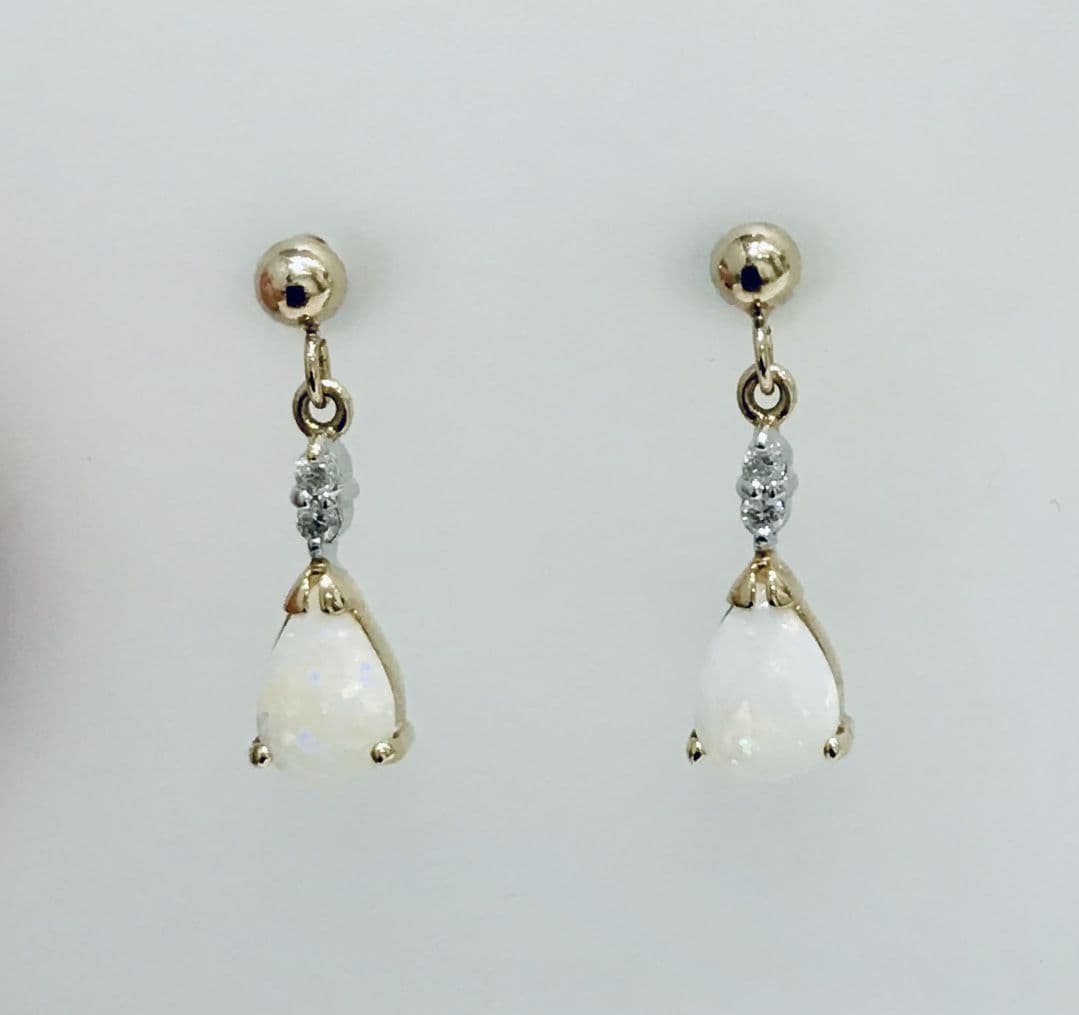 Pear shaped opal and diamond yellow gold drop earrings