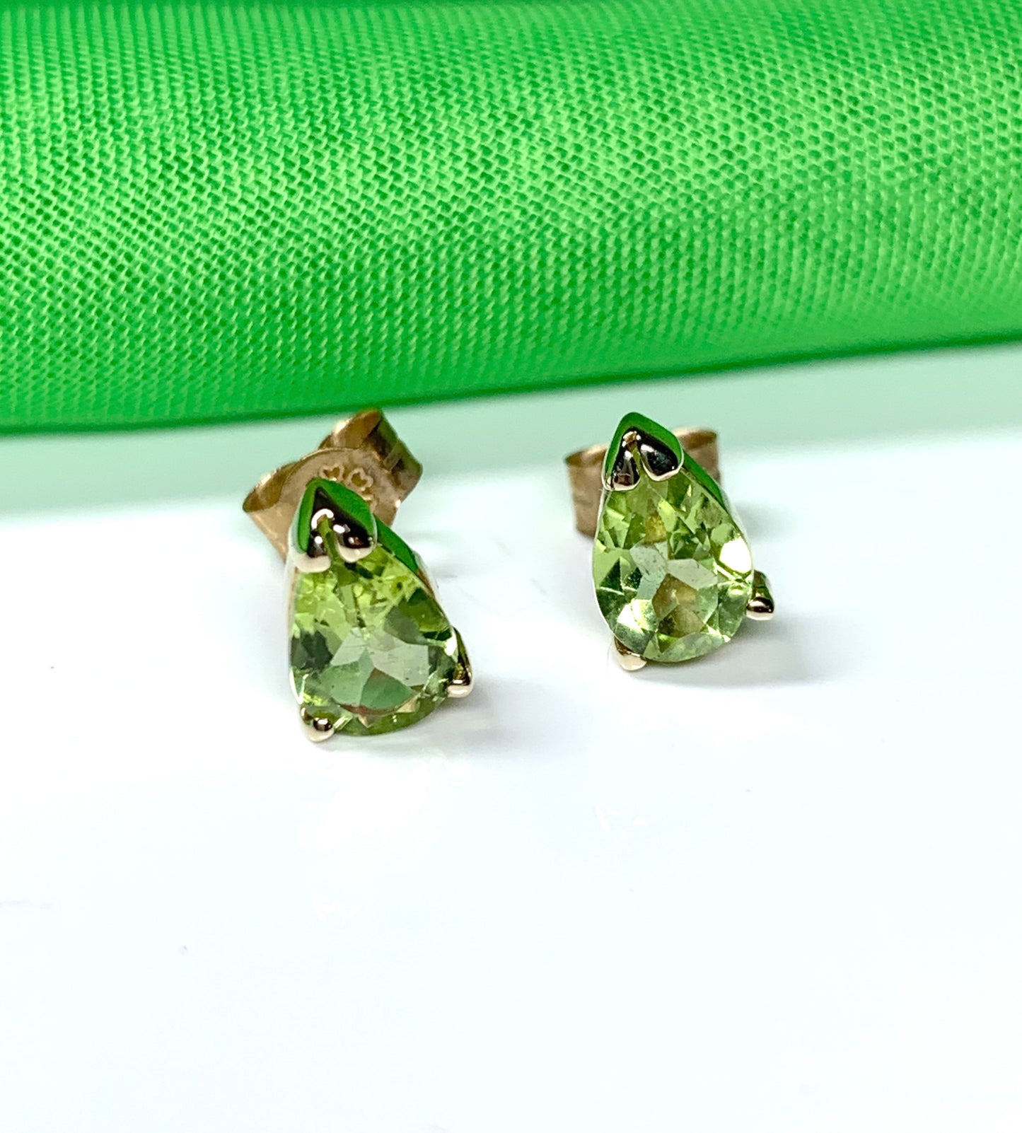 Pear Shaped Peridot Yellow Gold Stud Earrings