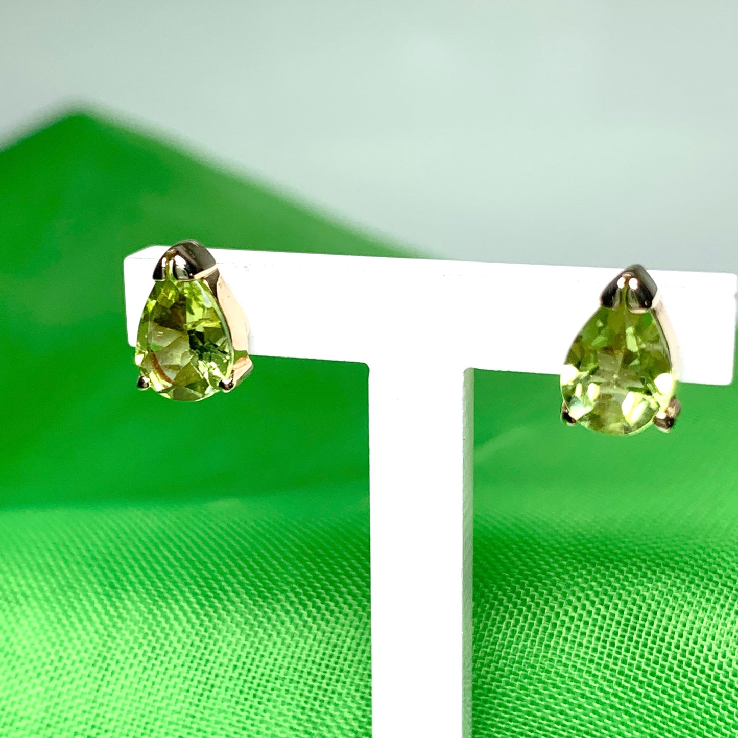 Pear Shaped Peridot Yellow Gold Stud Earrings