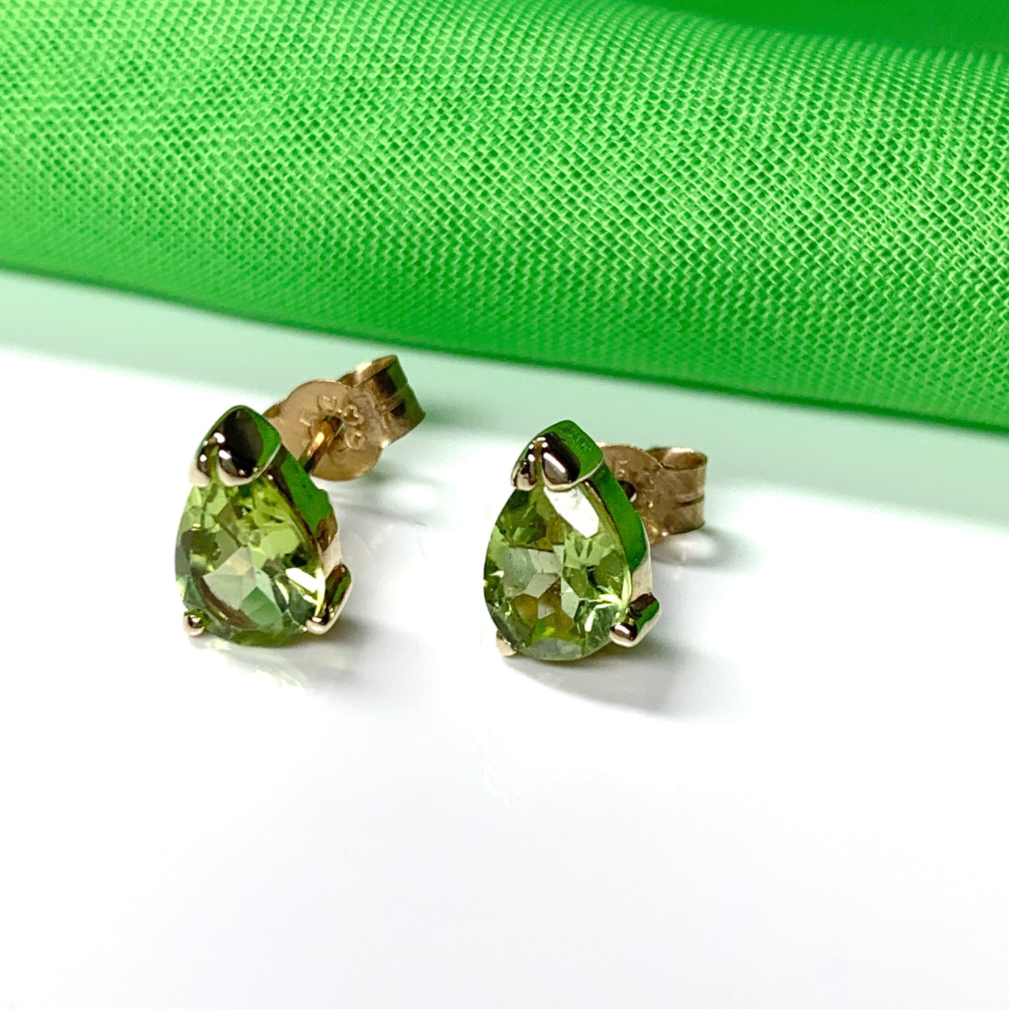 Pear Shaped Peridot Yellow Gold Stud Earrings