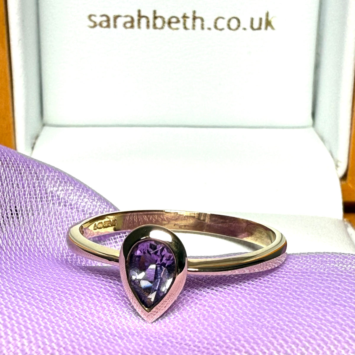 Pear shaped amethyst 9 carat yellow gold ring