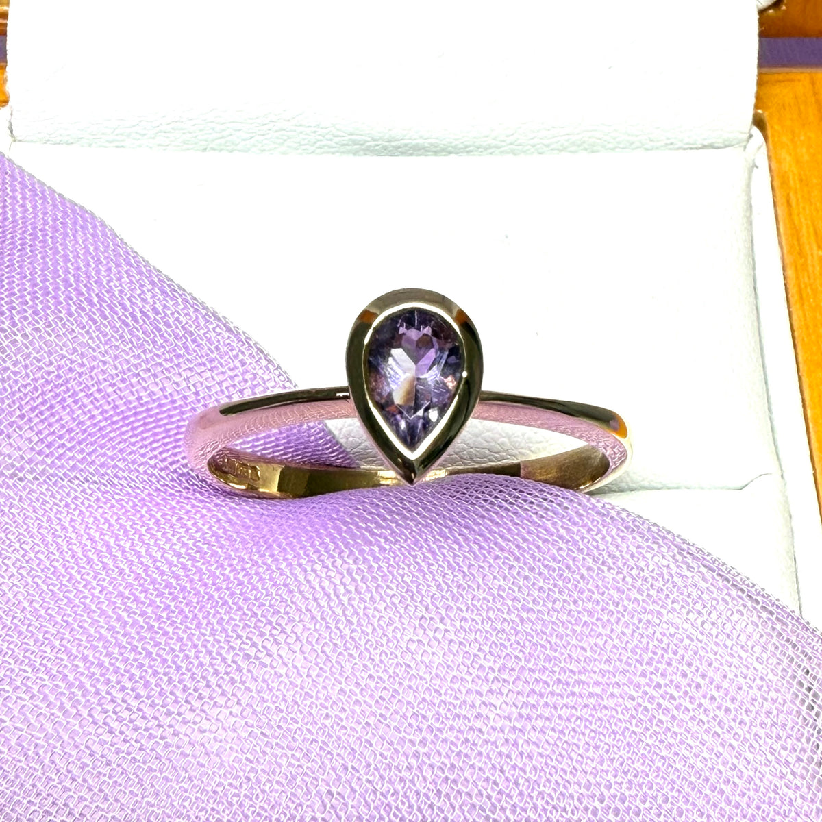 Pear shaped amethyst 9 carat yellow gold ring