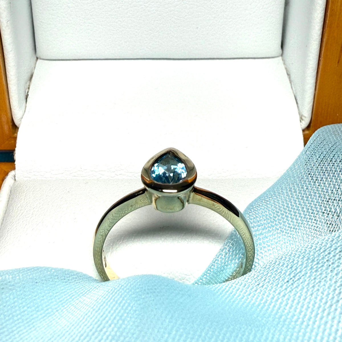 Pear shaped real blue topaz yellow gold dress ring teardrop