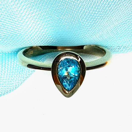 Pear shaped real blue topaz yellow gold dress ring teardrop