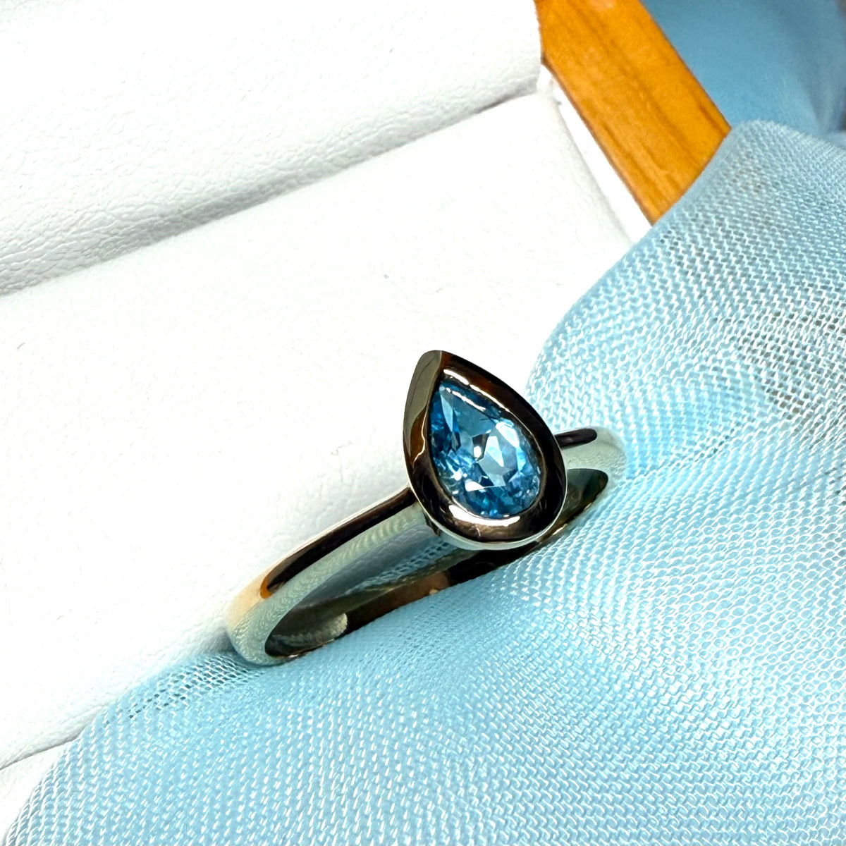 Pear shaped real blue topaz yellow gold dress ring teardrop