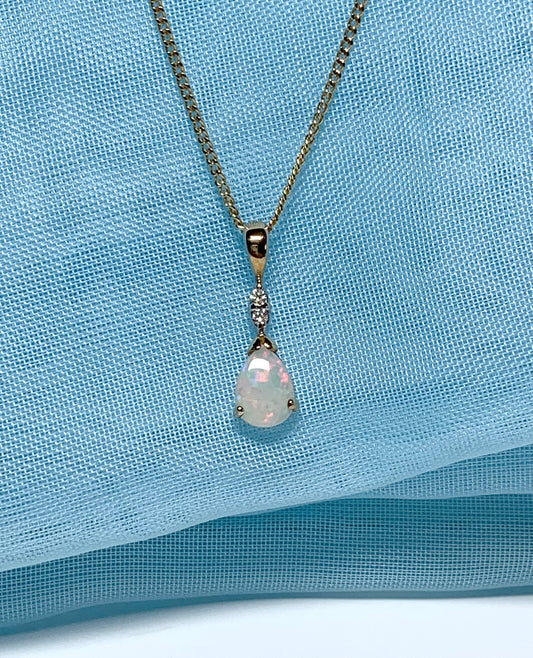 Pear shaped real opal and diamond yellow gold necklace