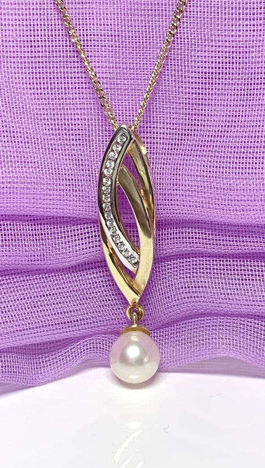 Pearl and cubic zirconia necklace freshwater cultured two tone gold pendant