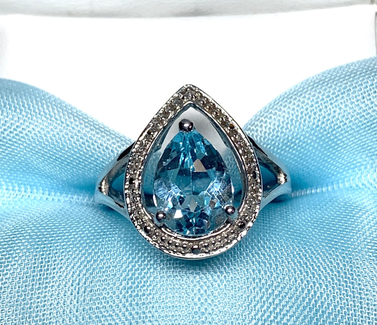Pear shaped blue topaz sterling silver cluster ring