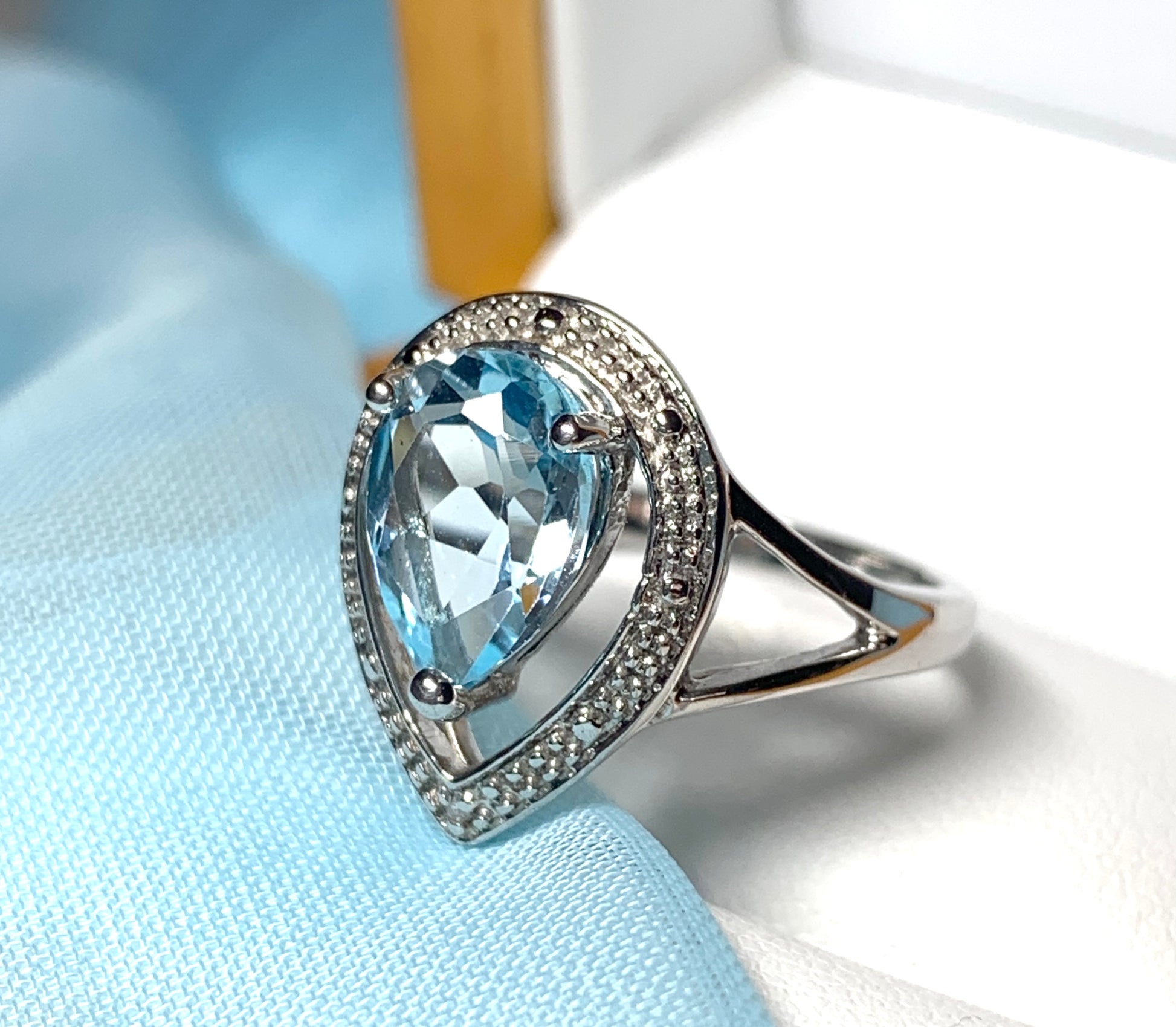 Pear shaped blue topaz sterling silver cluster ring