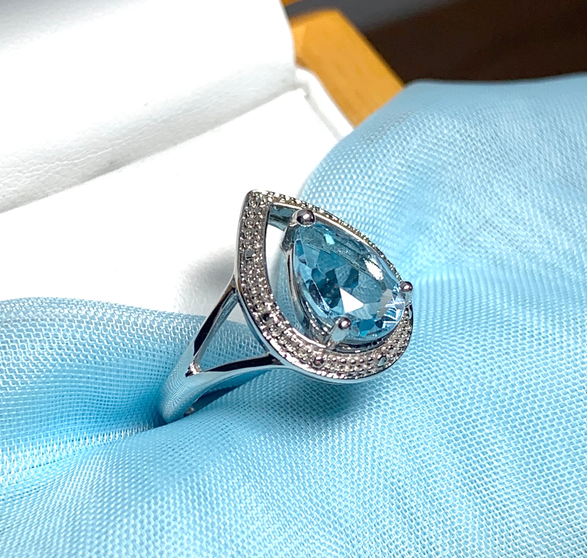 Pear shaped blue topaz sterling silver cluster ring