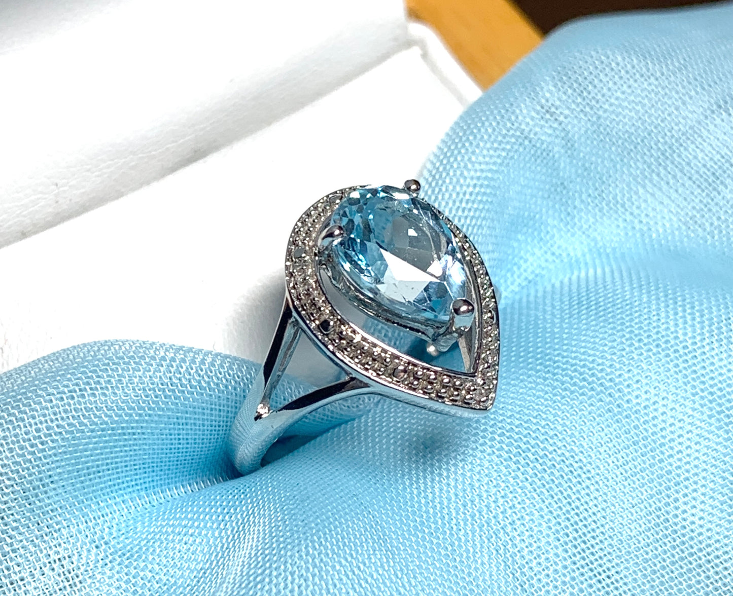 Pear shaped blue topaz sterling silver cluster ring