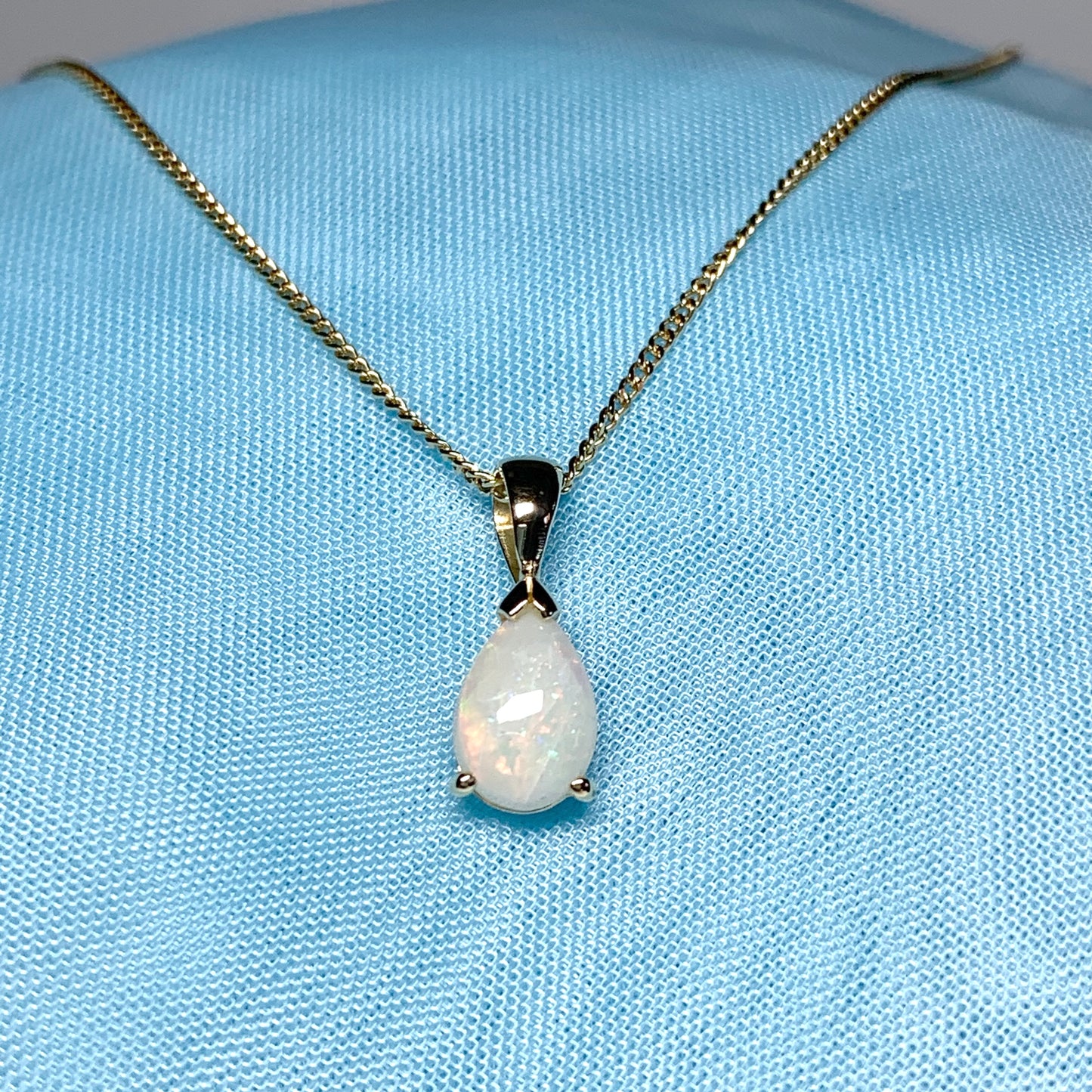 Opal yellow gold pear shaped necklace