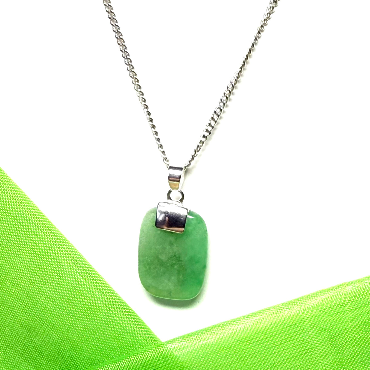 Pendant necklace having a real green jade stone sterling silver cushion shaped with a chain