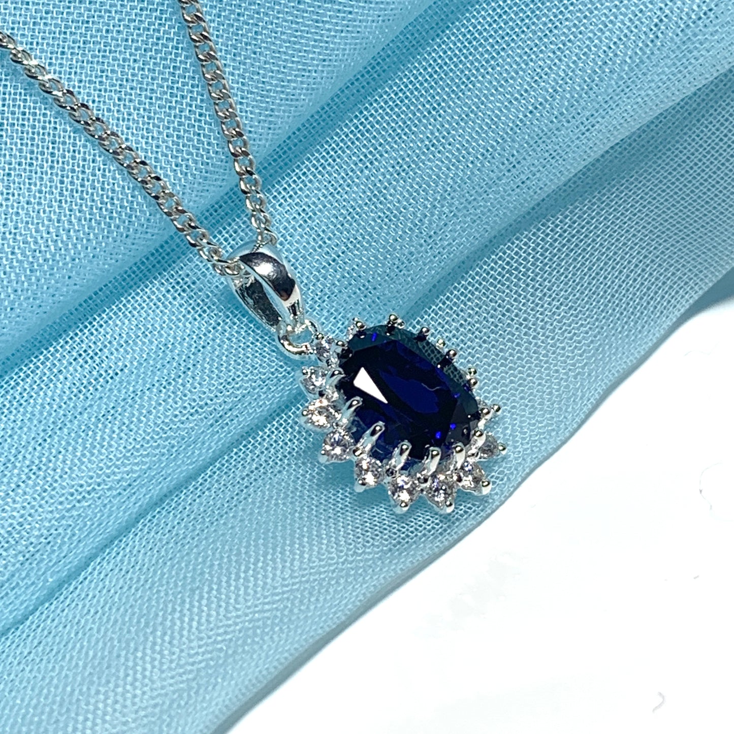 Large necklace deep sapphire blue white cubic zirconia oval cluster