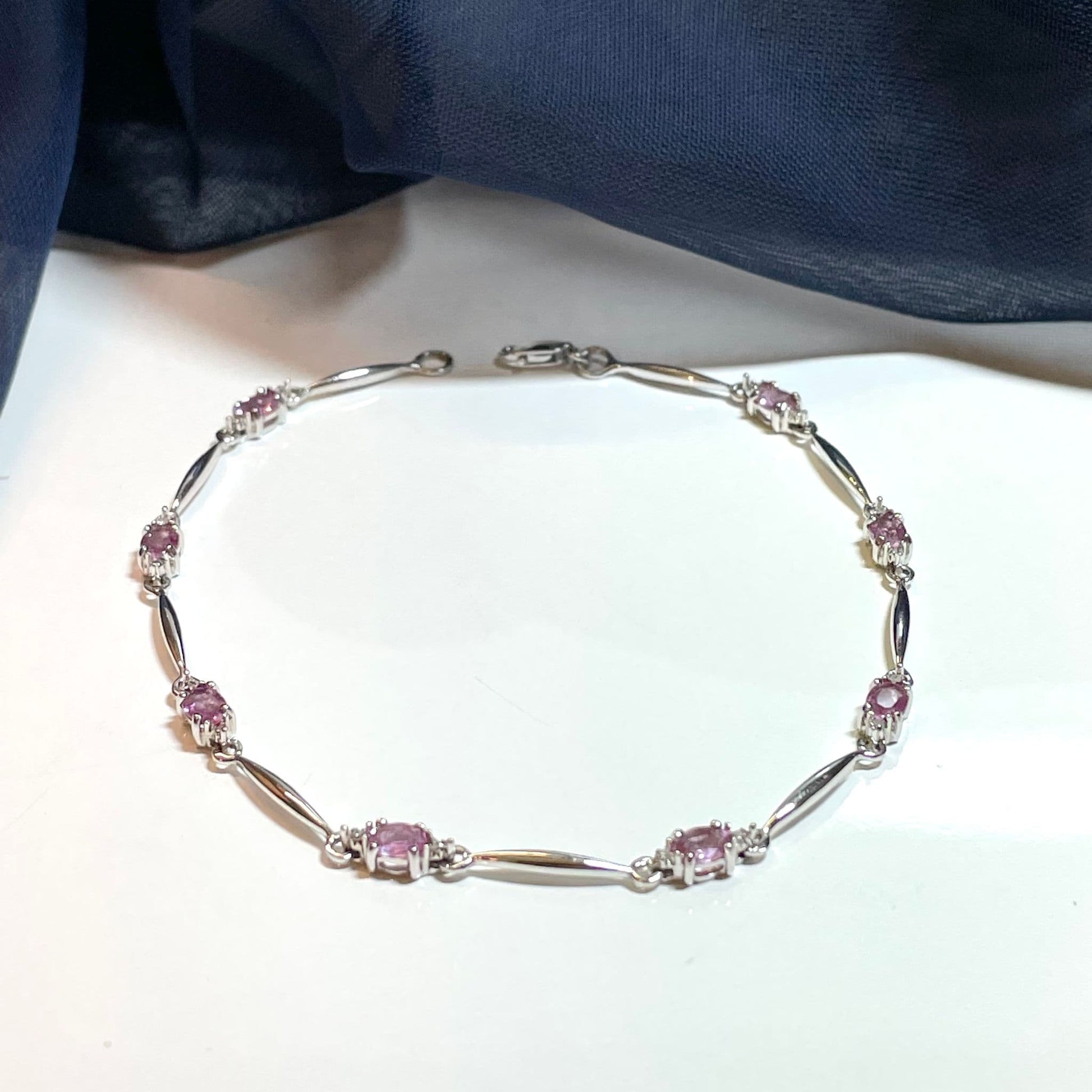Pink sapphire and diamond white gold bracelet