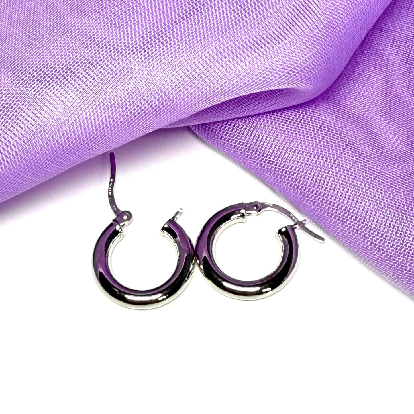Plain highly polished white gold hoop earrings 16 mm