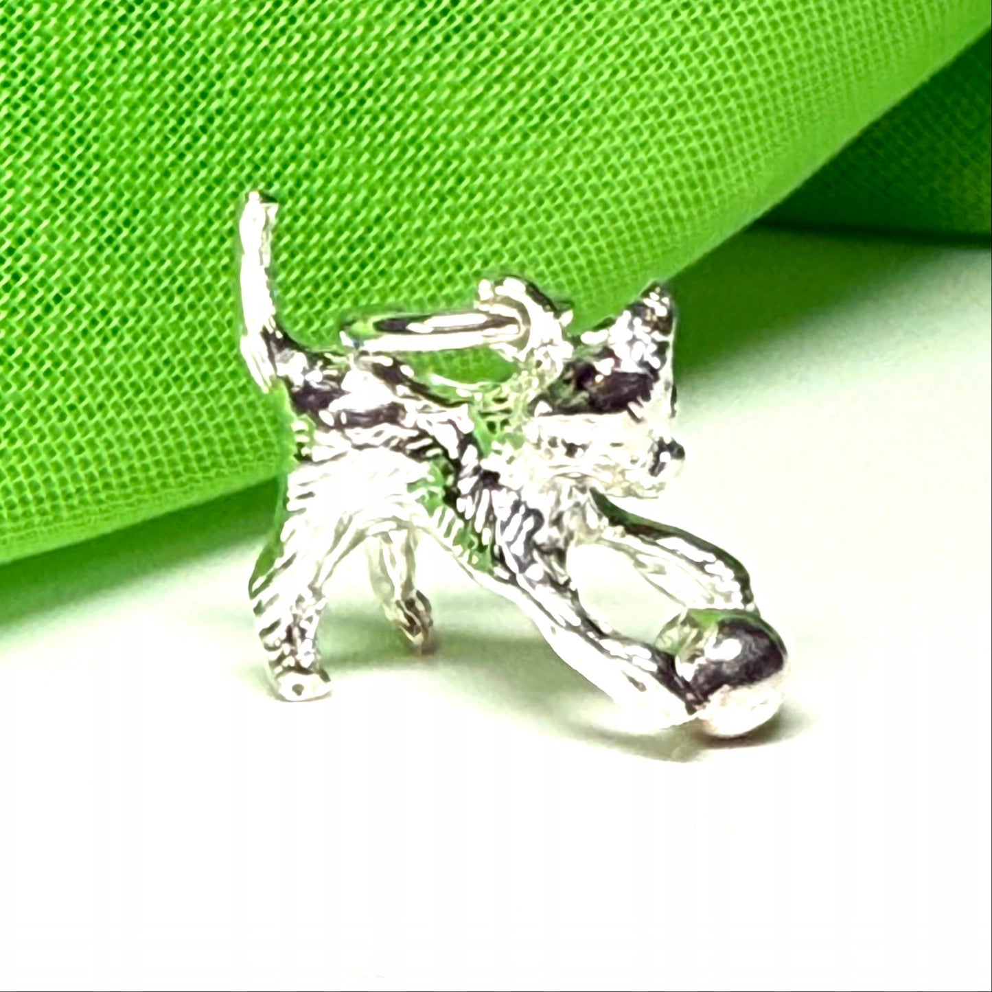 Playful cat and ball charm solid sterling silver