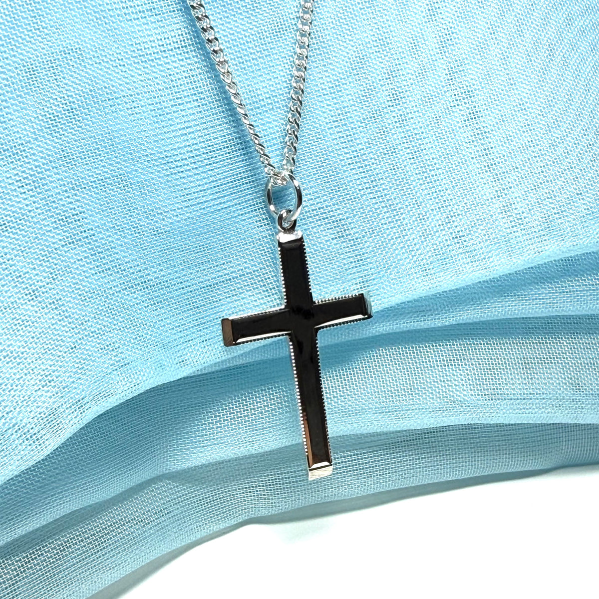 Polished beaded edge solid sterling silver cross including chain