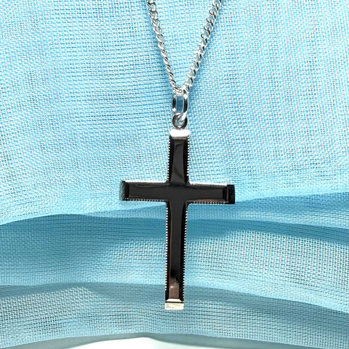 Polished beaded edge solid sterling silver cross including chain