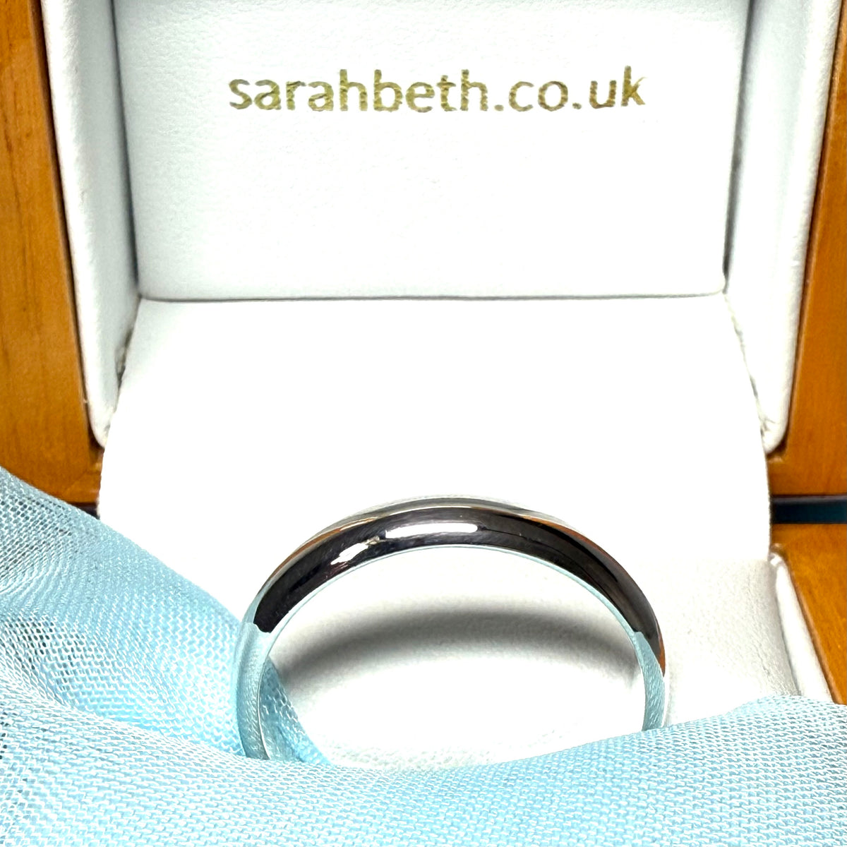 Polished plain sterling silver wedding ring 4 mm wide
