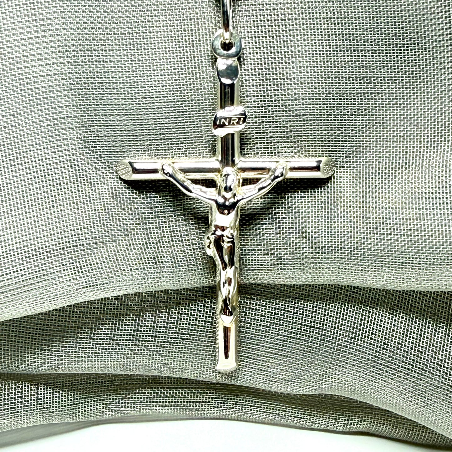 Polished sterling silver crucifix cross necklace including chain