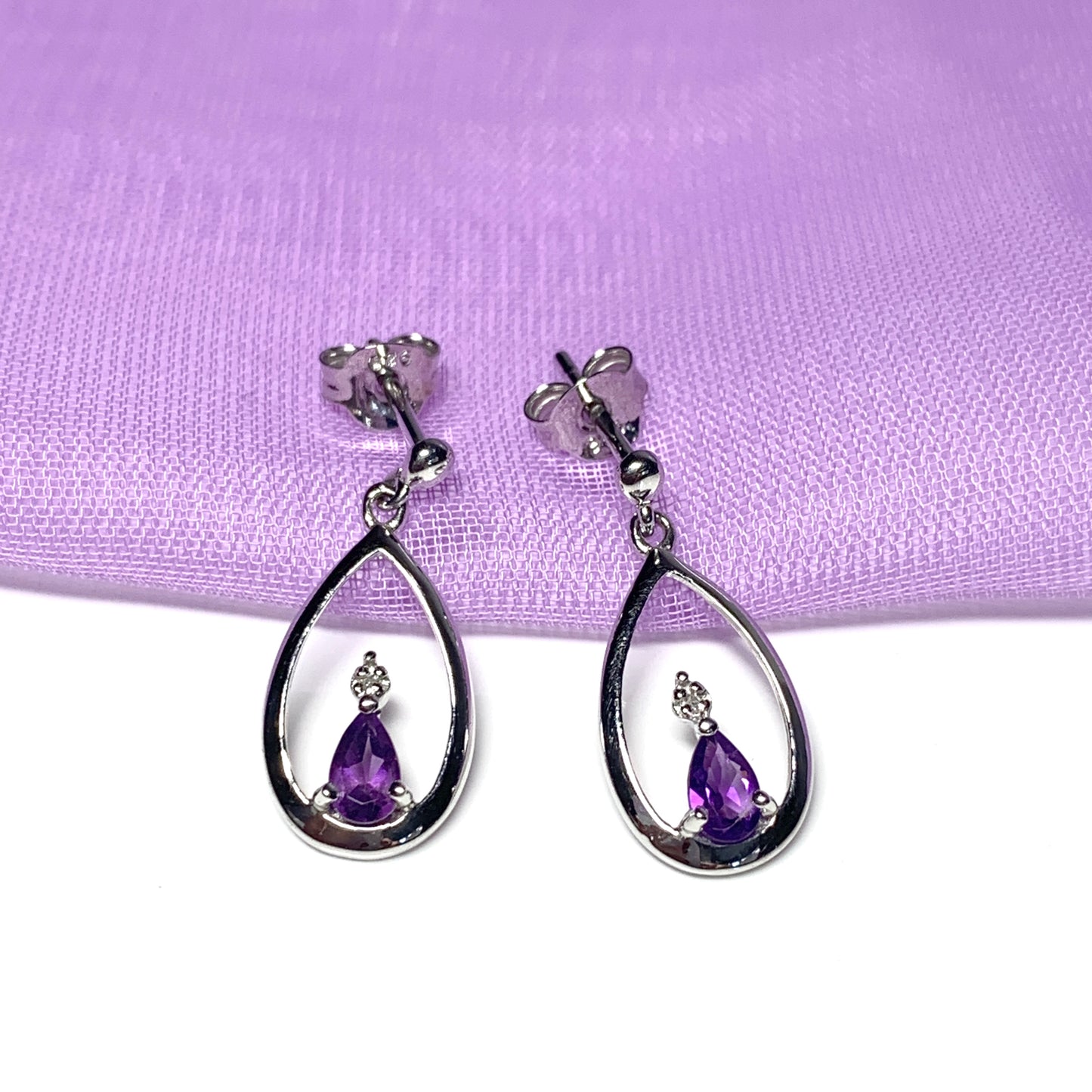 Purple amethyst and diamond sterling silver pear shaped drop earrings