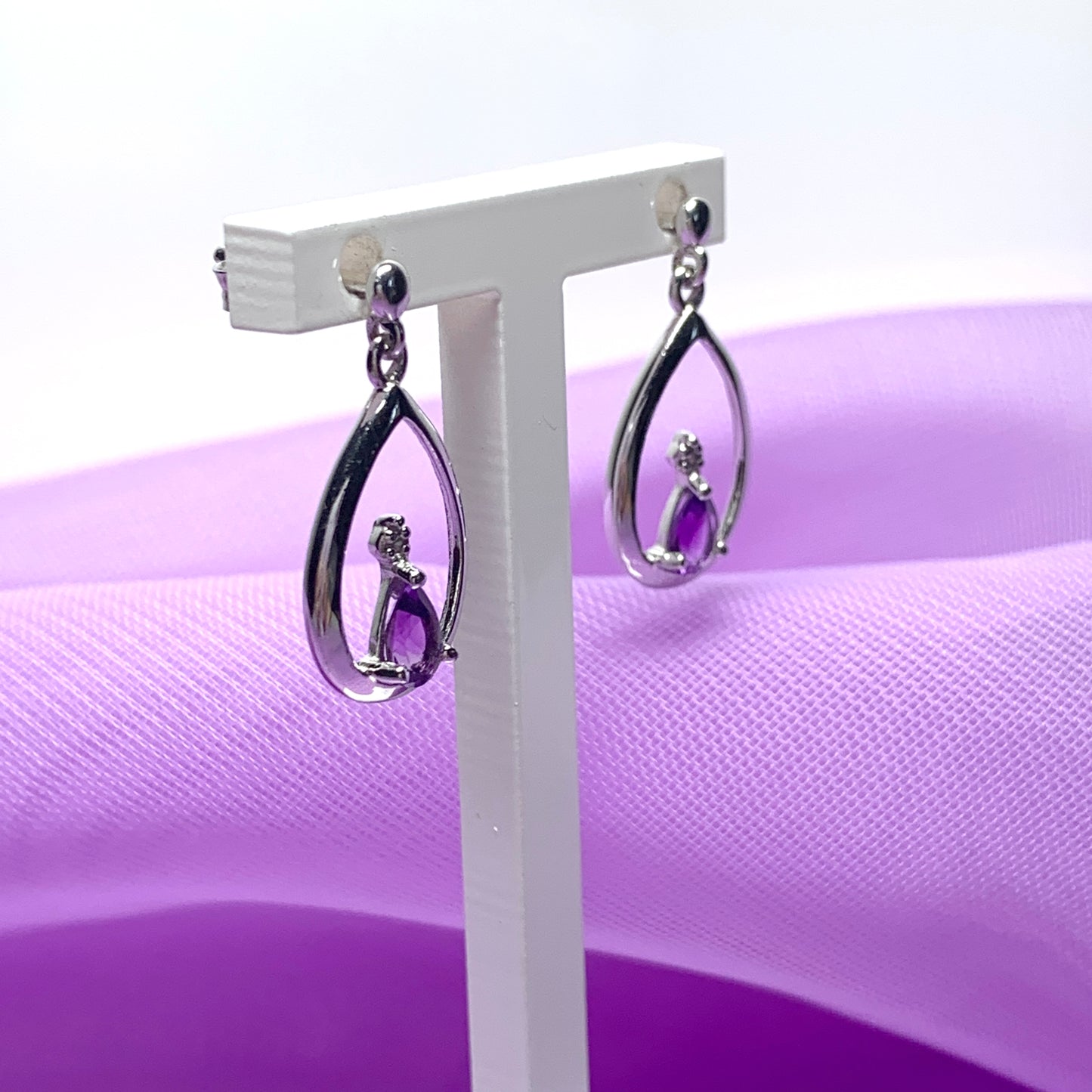 Purple amethyst and diamond sterling silver pear shaped drop earrings