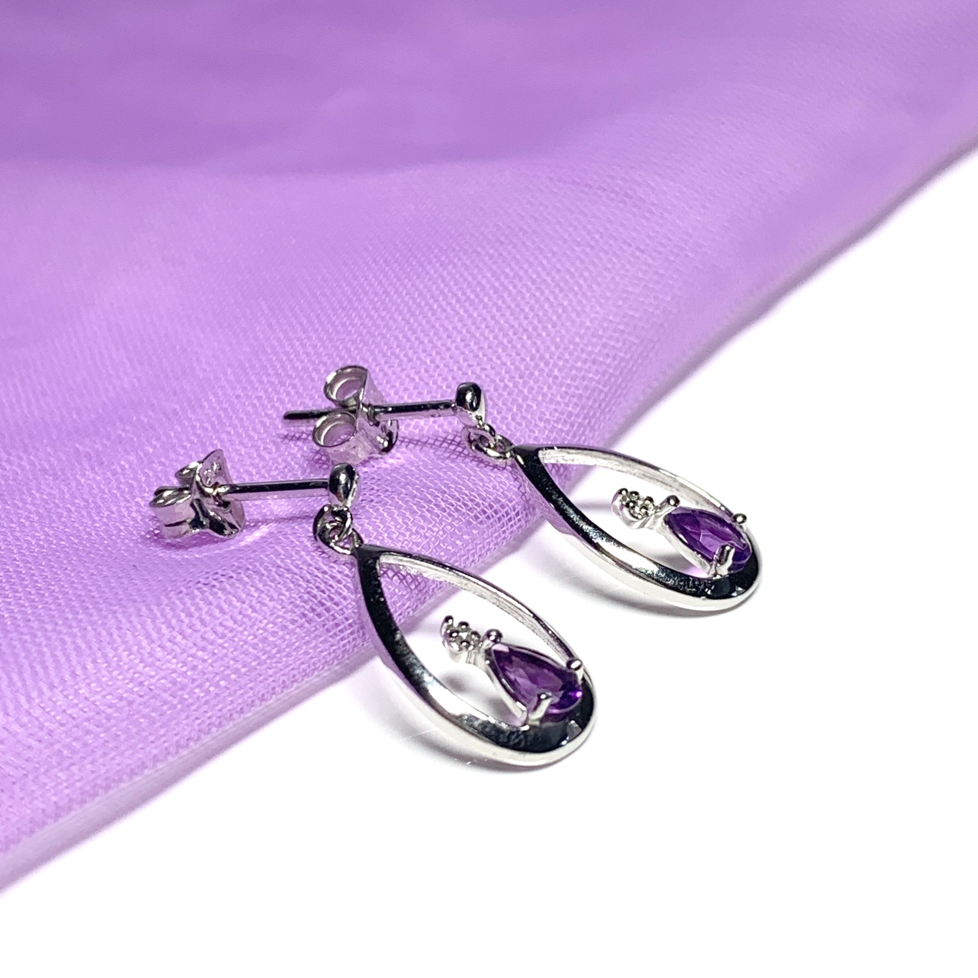 Purple amethyst and diamond sterling silver pear shaped drop earrings