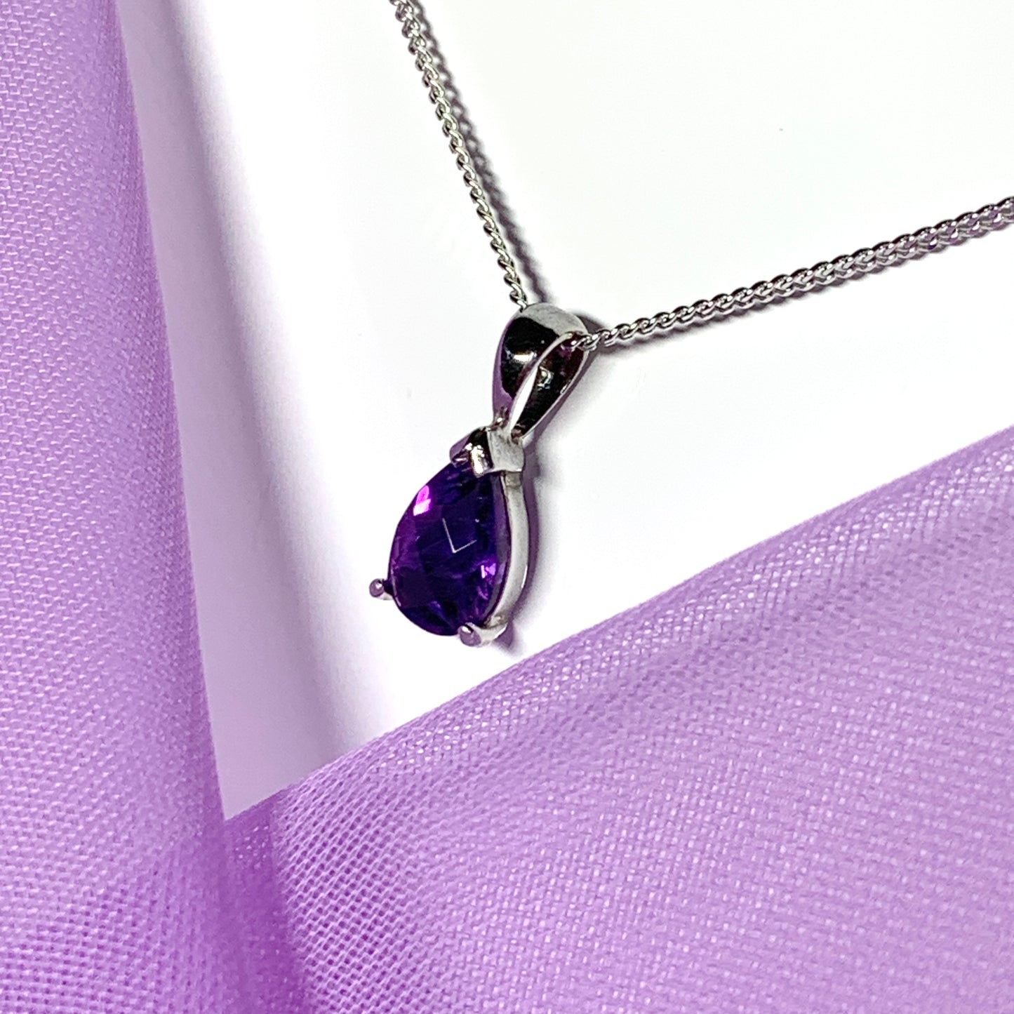 Purple pear shaped amethyst white gold necklace