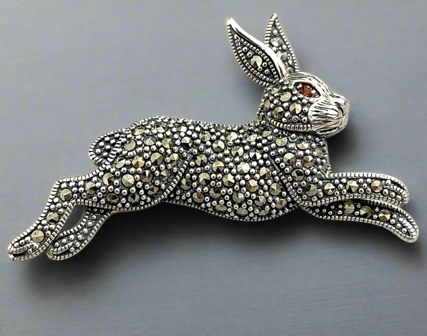 Rabbit hare running brooch marcasite and garnet