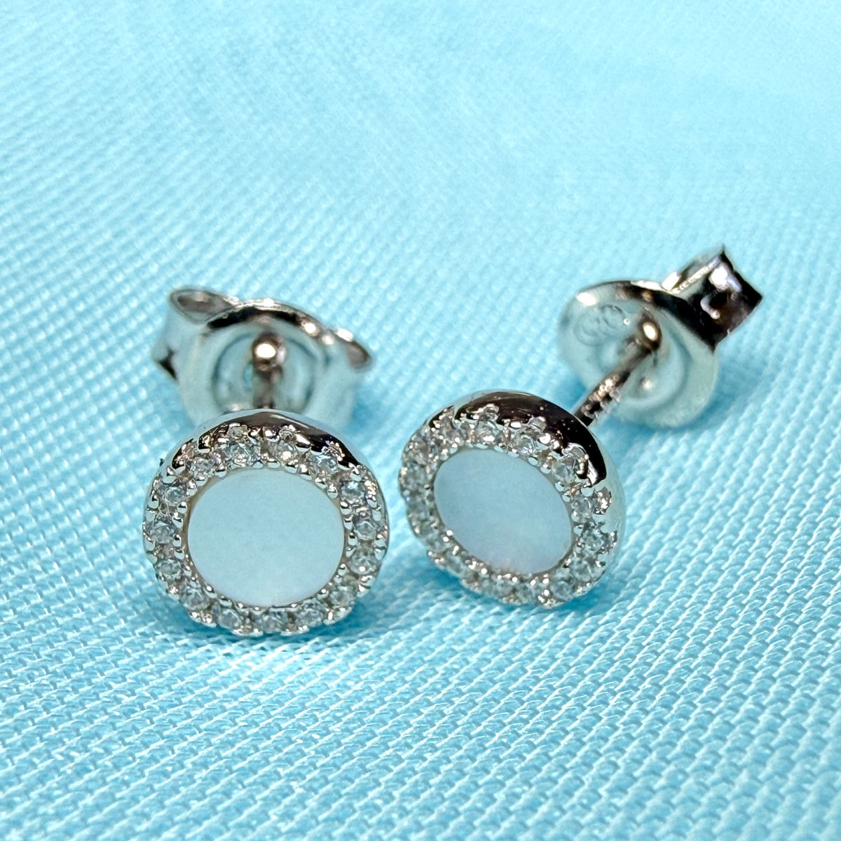 Real Mother of Pearl round stud earrings sterling silver cubic zirconia