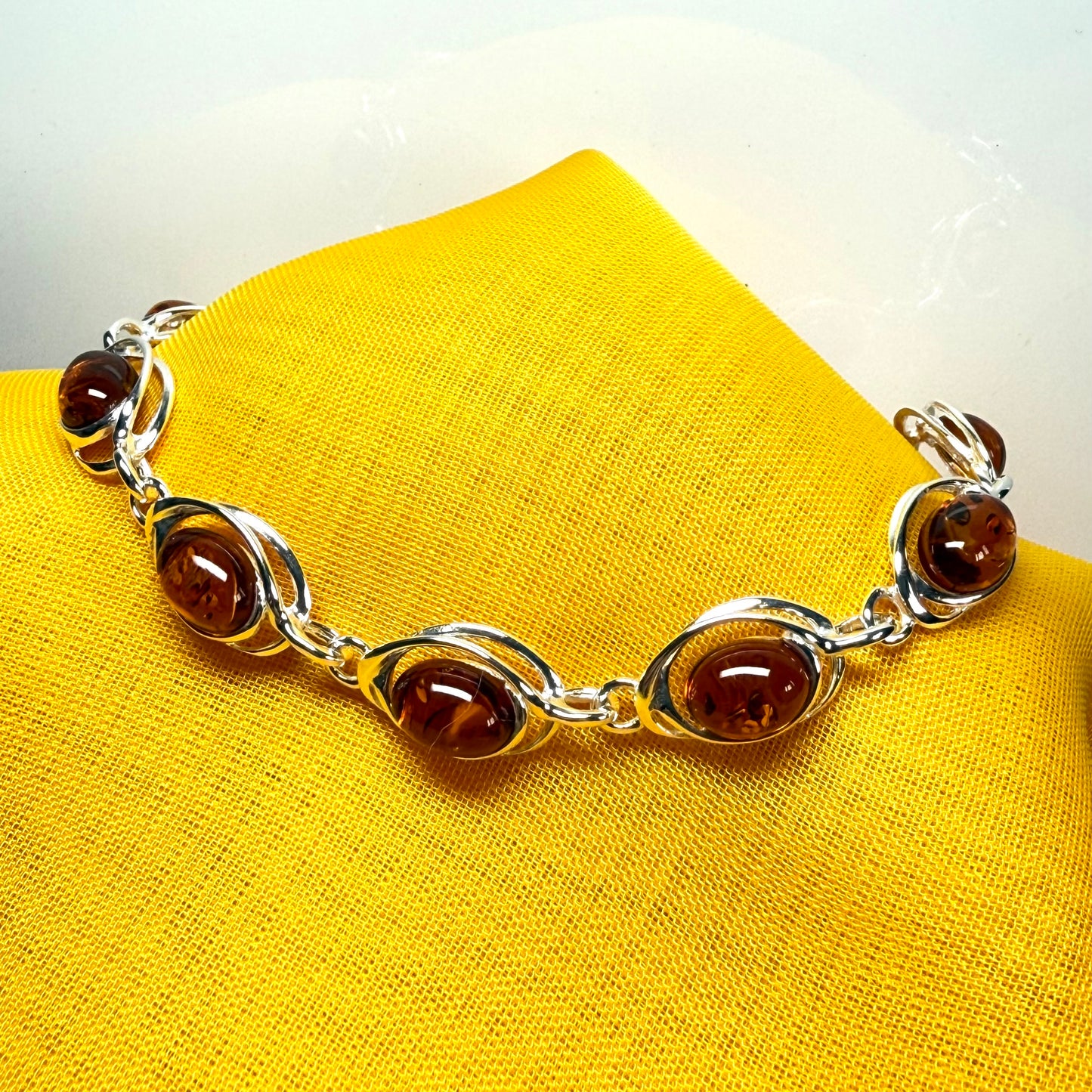 Real amber bracelet oval pierced fancy design