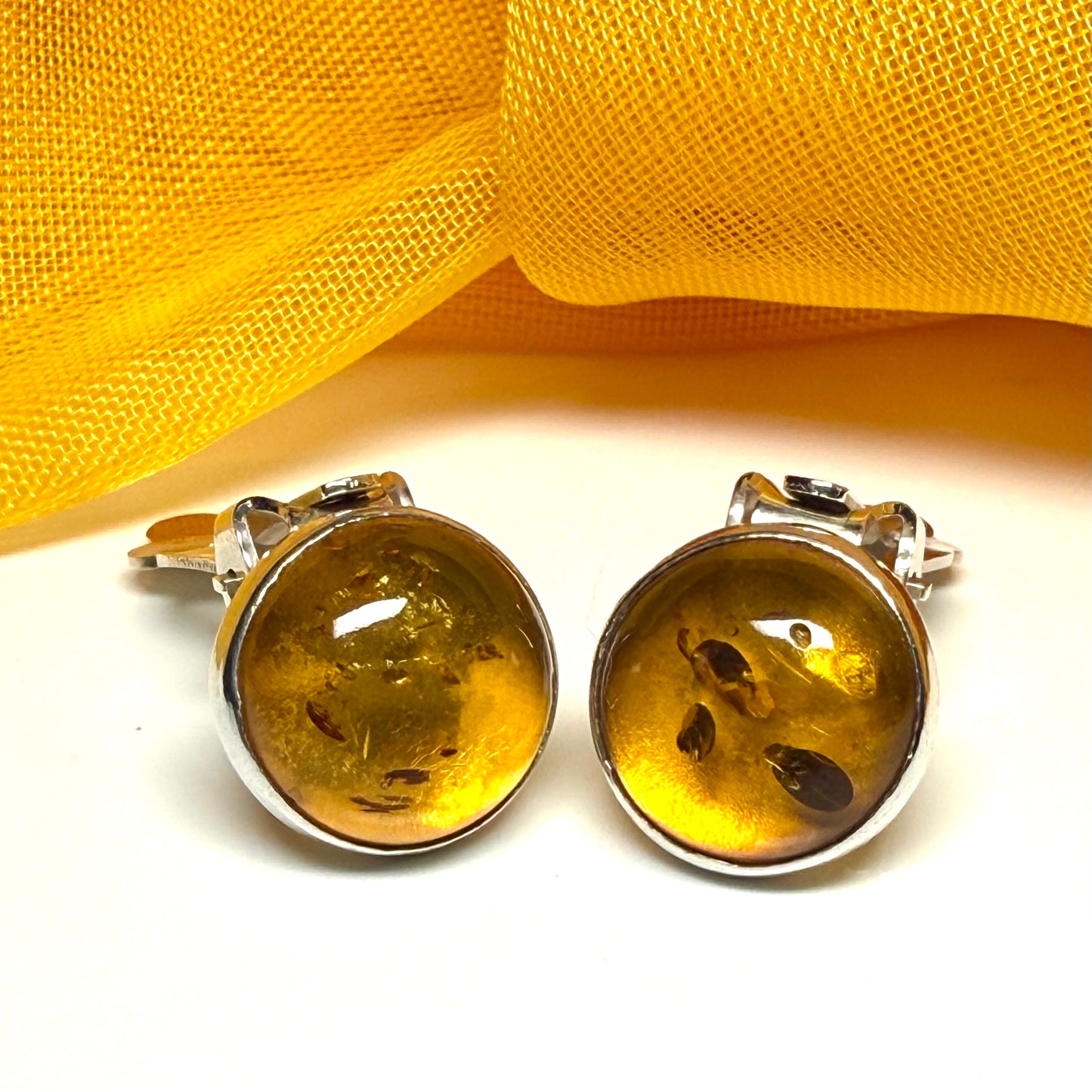 Real amber clip on earrings round sterling silver