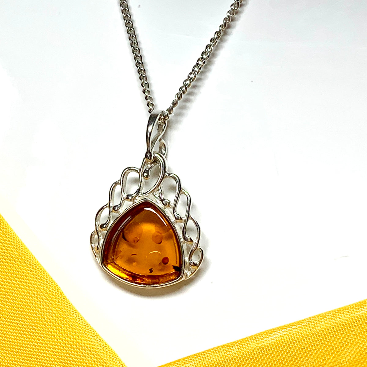 Real amber necklace sterling silver scrolled pendant