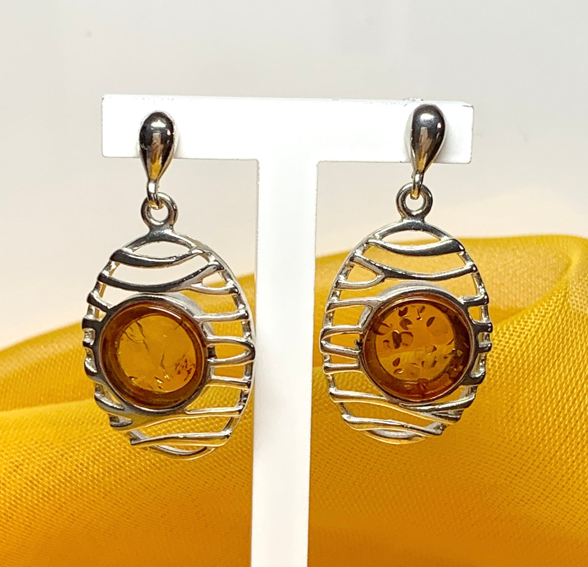 Orange real amber oval pierced open drop earrings sterling silver