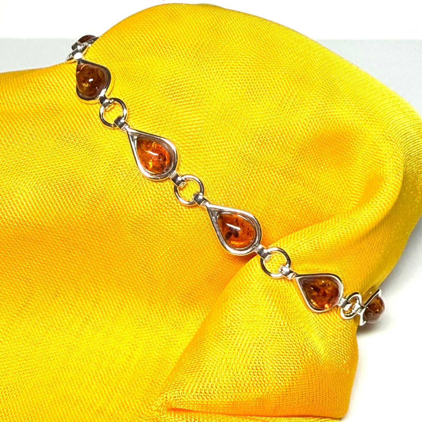 Real amber sterling silver pear shaped bracelet