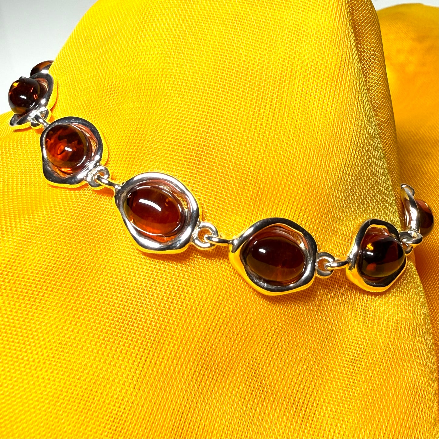 Real amber sterling silver fancy oval shaped bracelet
