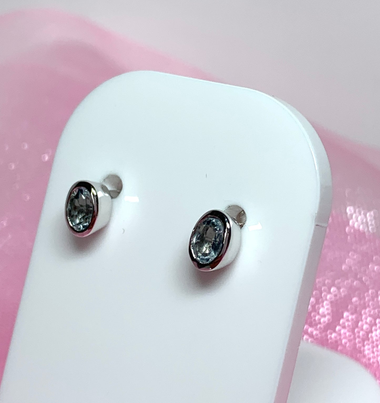 Real aquamarine 9 carat white gold oval earrings