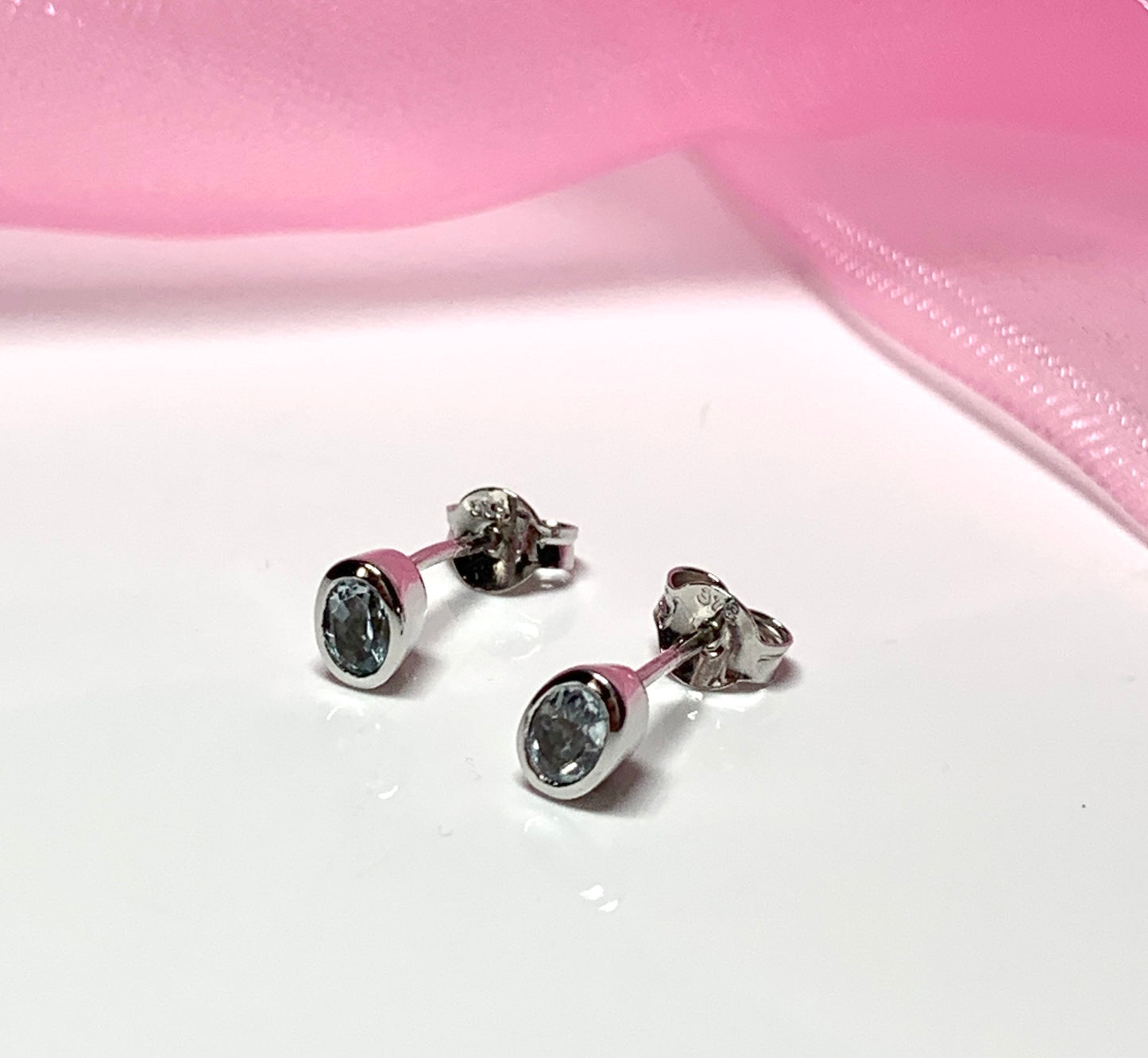 Real aquamarine 9 carat white gold oval earrings